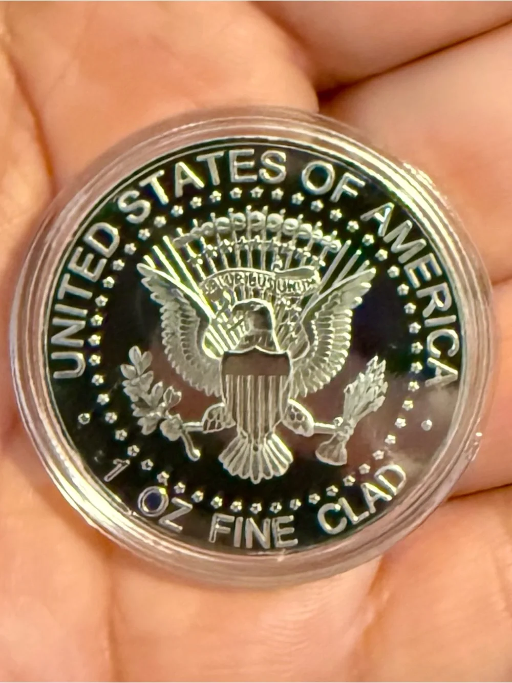 Silver-Tone 1964 Commemorative Coin in Protective Capsule
